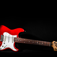 Buy canvas prints of Red Electric Guitar by Maggie McCall