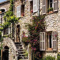 Buy canvas prints of  Street House In Saint Paul de Vence France by Maggie McCall