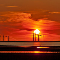 Buy canvas prints of New Brighton Sunset ( wind turbines at sea) by raymond mcbride