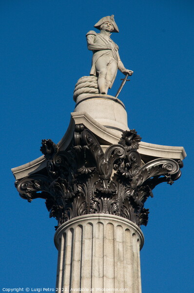 Low angle view of Nelson Column , London, UK. Picture Board by Luigi Petro