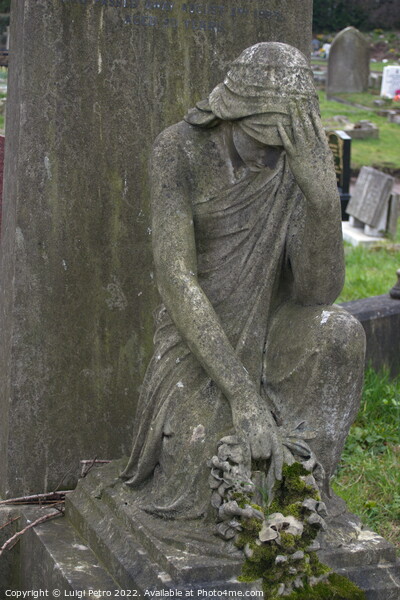 Statue of grieving  woman on a grave. Picture Board by Luigi Petro