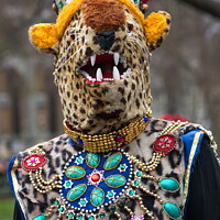 Buy canvas prints of Masked participant in the New Year Parade in London, UK. by Luigi Petro
