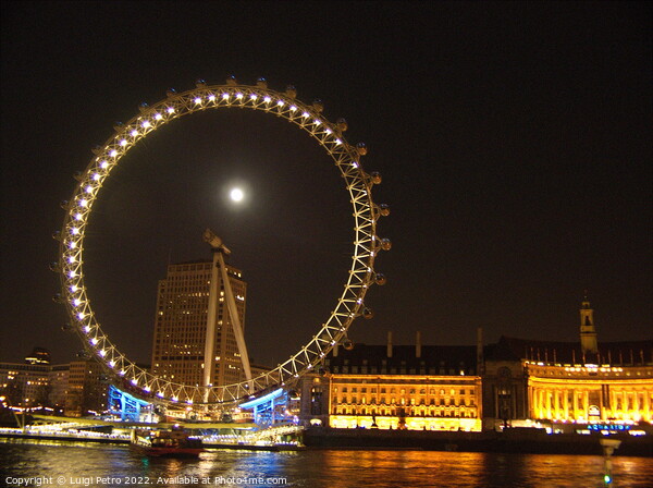 Night shot of the London Eye, London, UK. Picture Board by Luigi Petro