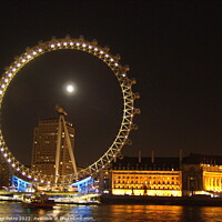 Buy canvas prints of Night shot of the London Eye, London, UK. by Luigi Petro