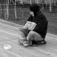 Buy canvas prints of Help a Homeless Man Survive Winter by Luigi Petro