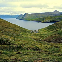 Buy canvas prints of Mountains and sea in the Faroe Islands  by Sue Bottomley