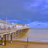 Buy canvas prints of Southwold Pier, beach and sea  by Sue Bottomley