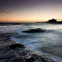 Buy canvas prints of Bamburgh Castle at Sunrise by David Smith
