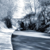 Buy canvas prints of Frozen Canal by Brian  Raggatt