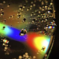 Buy canvas prints of Water Drop Disc- Glow by Brian  Raggatt