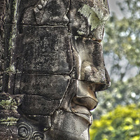 Buy canvas prints of  Carved Head Angkor Cambodia by Brian  Raggatt