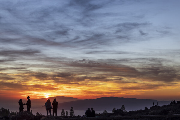 Tourists watch dramatic sunset from Tenerife Picture Board by Phil Crean
