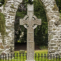 Buy canvas prints of Celtic cross and stone arch Ireland by Phil Crean