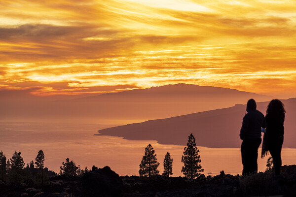 Tourists watch dramatic sunset from Tenerife Picture Board by Phil Crean
