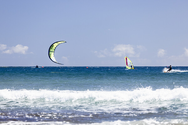 Kitesurfer on blue seas at  El Medano Tenerife Picture Board by Phil Crean