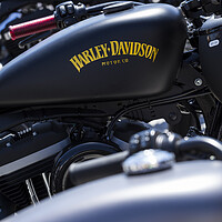 Buy canvas prints of Abstract detail of a row of parked Harley davidson bikes by Phil Crean