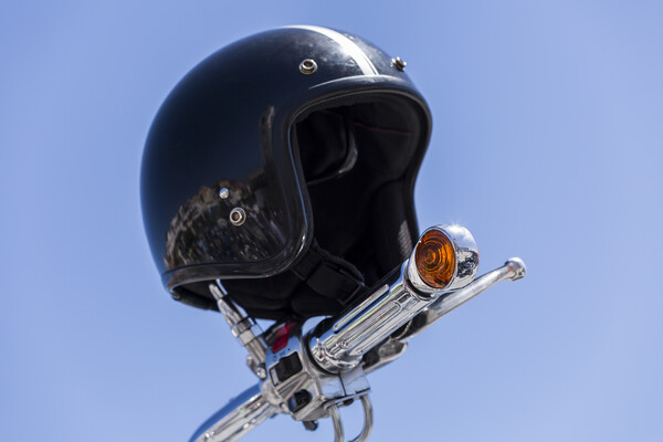 Crash helmet on handlebars Picture Board by Phil Crean