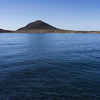 Buy canvas prints of Red boat in the blue sea, El Medano, Tenerife by Phil Crean