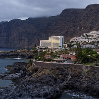 Buy canvas prints of Los Gigantes hotel and village at sunset, Tenerife by Phil Crean