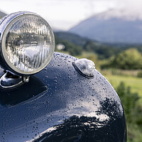 Buy canvas prints of Headlamp and mudguard in the rain. by Phil Crean