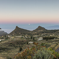 Buy canvas prints of Full moon setting at dawn Tenerife by Phil Crean