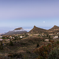 Buy canvas prints of Full moon setting over Tres Roques Tenerife by Phil Crean