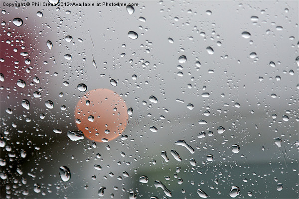 Raindrops and orange circle on window Picture Board by Phil Crean