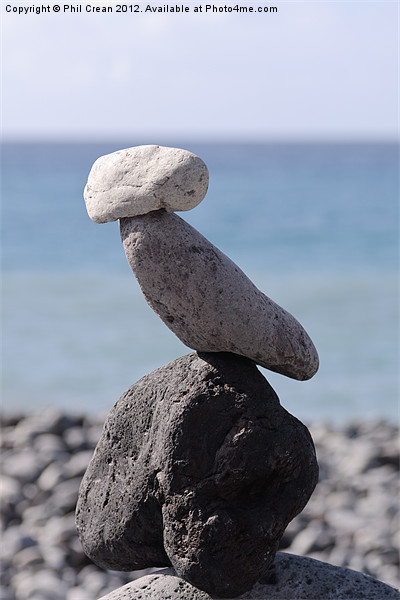 Stone cairn, rocks perched on beach, Tenerife Picture Board by Phil Crean