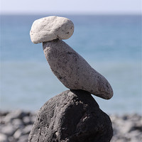 Buy canvas prints of Stone cairn, rocks perched on beach, Tenerife by Phil Crean