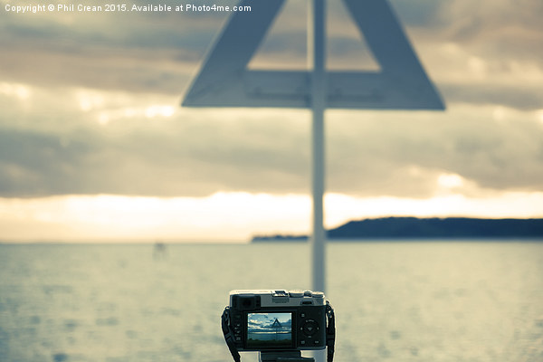 Fuji camera photographing seascape in New Zealand Picture Board by Phil Crean