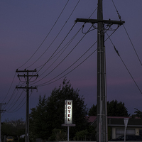 Buy canvas prints of Motel neon sign, twilight, New Zealand by Phil Crean