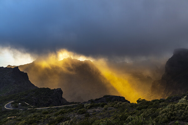 Golden rays of sunshine through the rainclouds Picture Board by Phil Crean