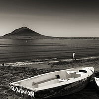 Buy canvas prints of Old boats on the foreshore at El Medano, Tenerife by Phil Crean
