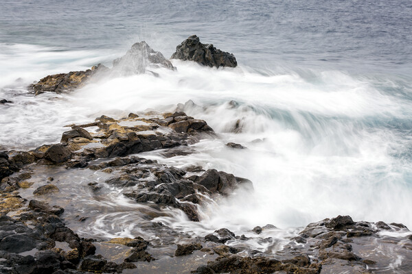 Ocean swirling over rocks Tenerife Picture Board by Phil Crean