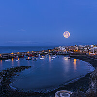 Buy canvas prints of Snow moonsetting over Playa San Juan, Tenerife by Phil Crean