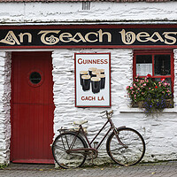 Buy canvas prints of Bicycle outside pub, West Cork, Ireland by Phil Crean