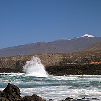 Buy canvas prints of Rough seas at Palm Mar, and snowcapped Teide, Tenerife by Phil Crean