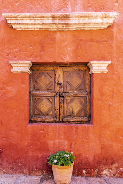 Wooden window shutters, red wall in the Santa Catalina Monastery, Peru Picture Board by Phil Crean