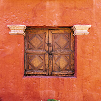 Buy canvas prints of Wooden window shutters, red wall in the Santa Catalina Monastery, Peru by Phil Crean
