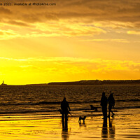 Buy canvas prints of Dog walkers on the beach at sunrise by Jim Jones