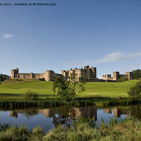 Buy canvas prints of Alnwick Castle reflected in the River Aln by Jim Jones