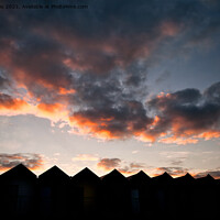 Buy canvas prints of Silhouetted Beach Huts at Blyth (2) by Jim Jones