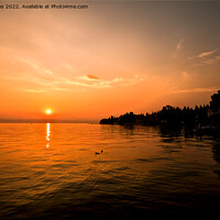 Buy canvas prints of Serene Sirmione A Breathtaking Sunset by Jim Jones