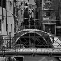 Buy canvas prints of Small Canal in Venice - Monochrome by Jim Jones