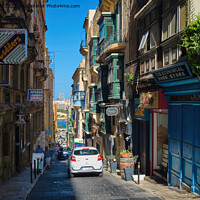 Buy canvas prints of The Economical Shoe Store, Valletta by Jim Jones