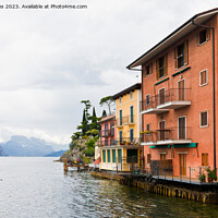 Buy canvas prints of Colourful Houses of Malcesine on Lake Garda by Jim Jones