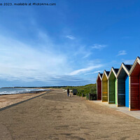 Buy canvas prints of A Vibrant Stroll by the Seaside  by Jim Jones
