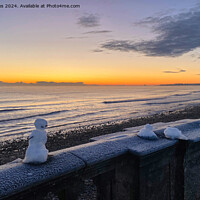 Buy canvas prints of Snowman on the balustrade by Jim Jones