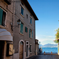Buy canvas prints of Sunshine and Shadow on Lake Garda by Jim Jones