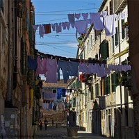 Buy canvas prints of Venetian street on washing day by Jim Jones